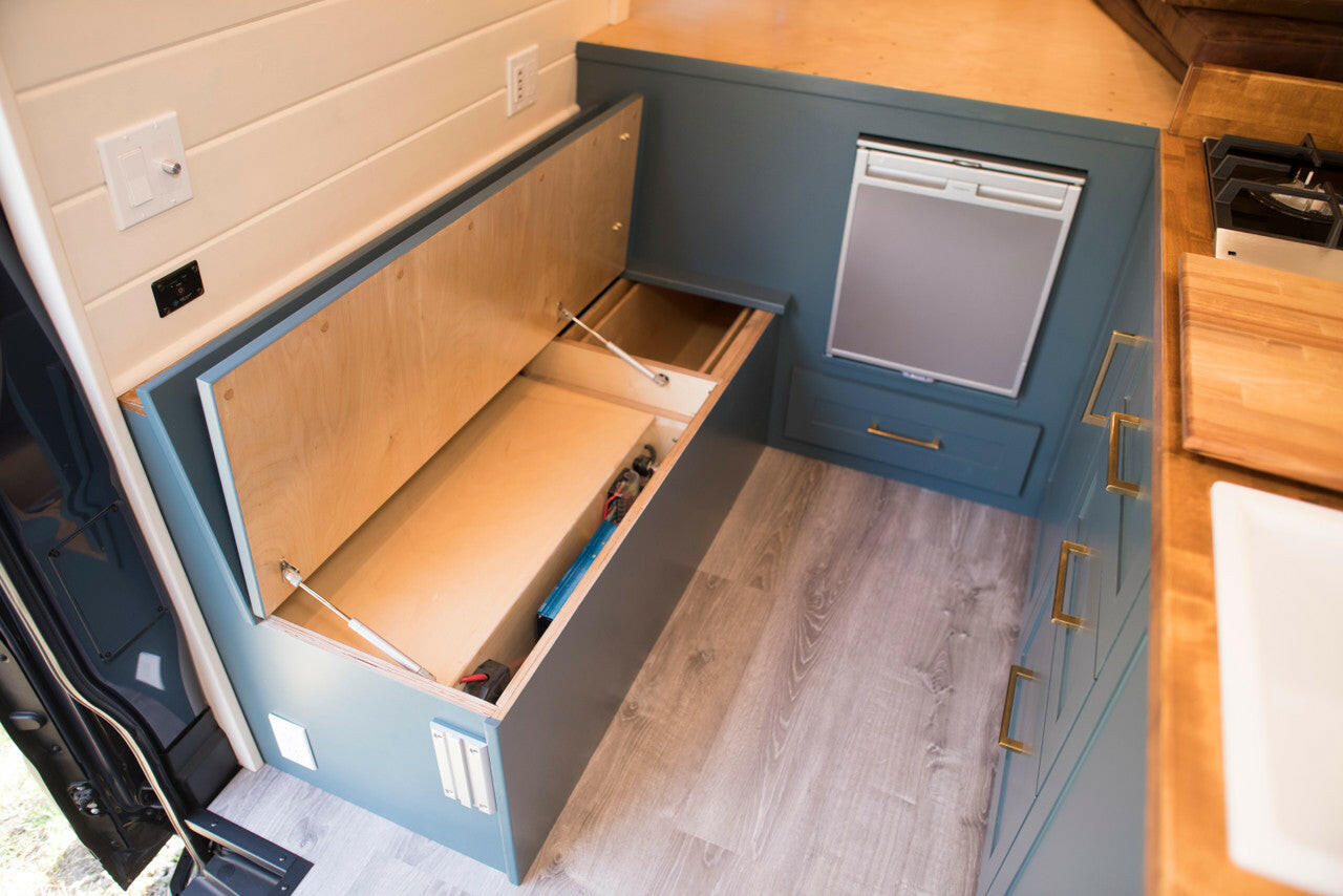 The bench seat lifts up to provide easy access to the electrical and storage compartment.
